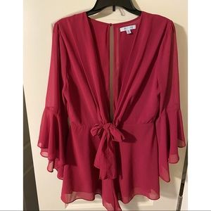 Long-sleeve romper worn once for wedding